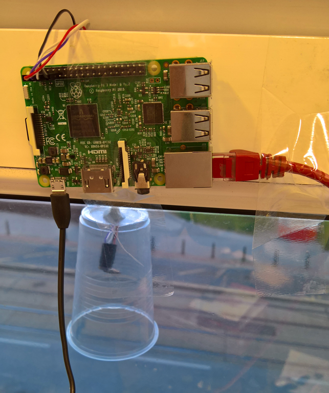 Raspberry PI attached to a window with BME280 sensor outside